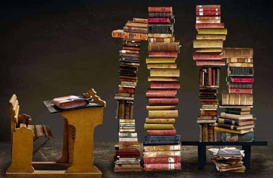 ADHD in Children. Picture shows a school bank and piling books in fron of it